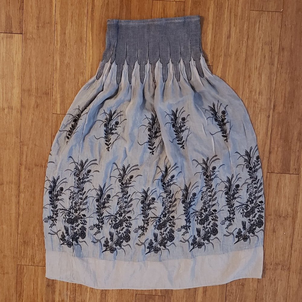 Skirt doubles as maxi mid length dress